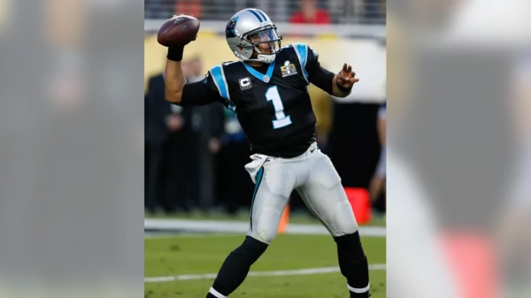 Cam Newton passing the ball in the Super Bowl (2015).webp